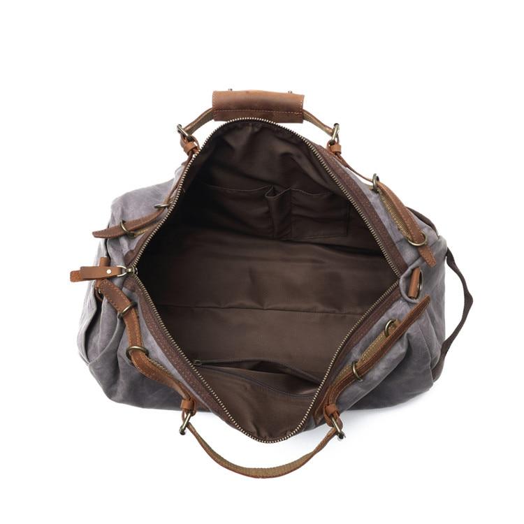 Canvas travel duffel carry-all bag with sturdy stitching, seams and webbing
