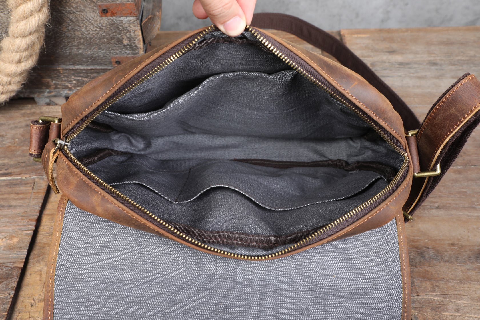 aged leather messenger bag
