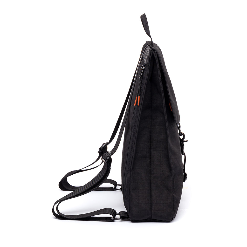 side view of the mini handy vandra black sustainable backpack