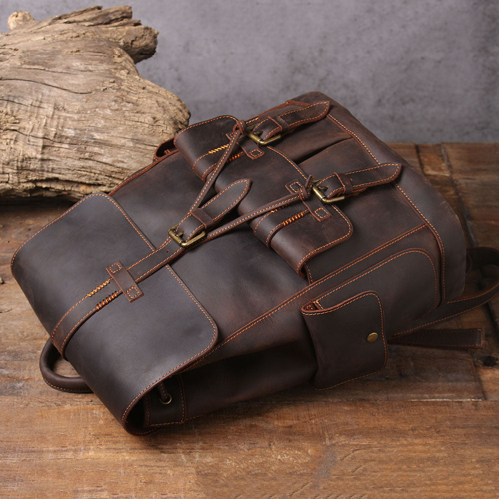 brown business laptop bag with sturdy stitchinig and webbing and zipped pockets