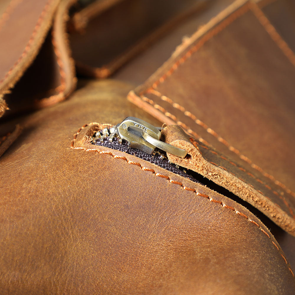 brown leather backpack