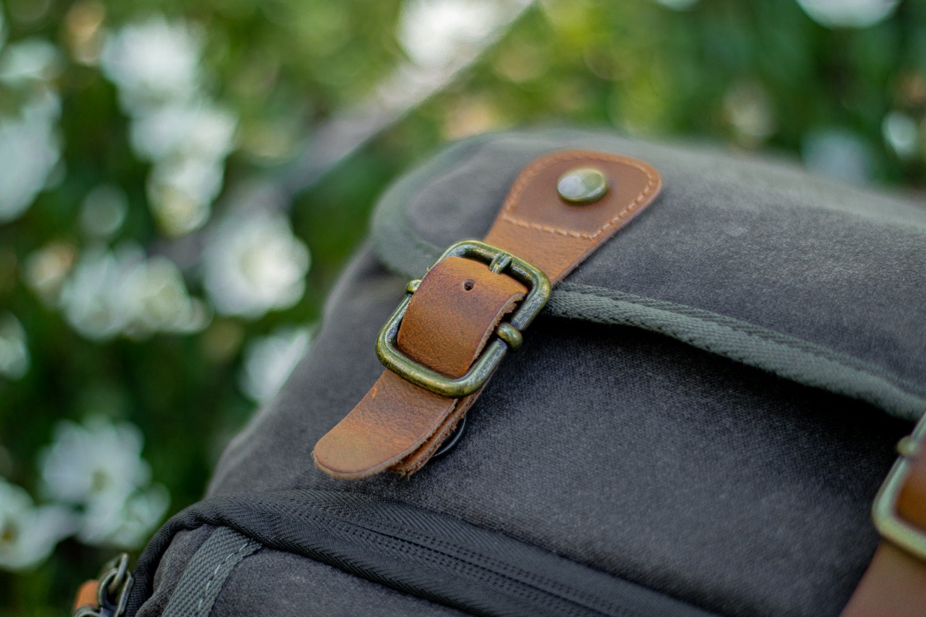 Vintage Photo Bag Backpack with a lens case to store digital slr camera, telephoto zoom-lens, a gopro hero, memory cards and chargers