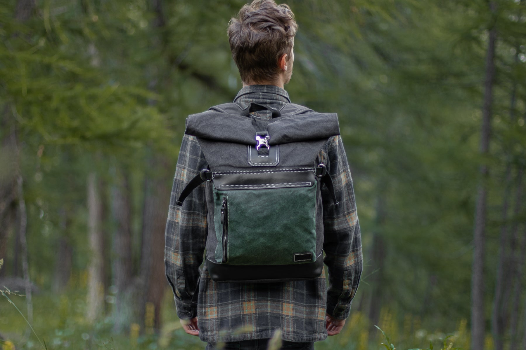 school backpack to store school supplies like textbooks, a water-bottle, a lunch box and a macbook