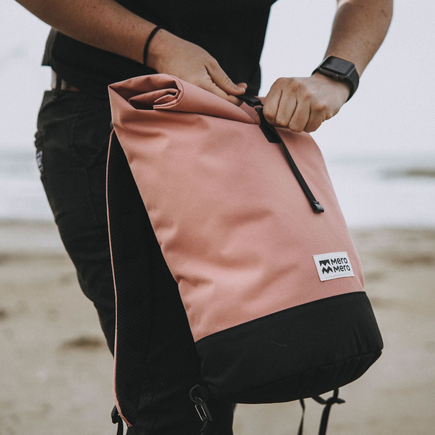 expandable roll top pink eco friendly backpack from mero mero