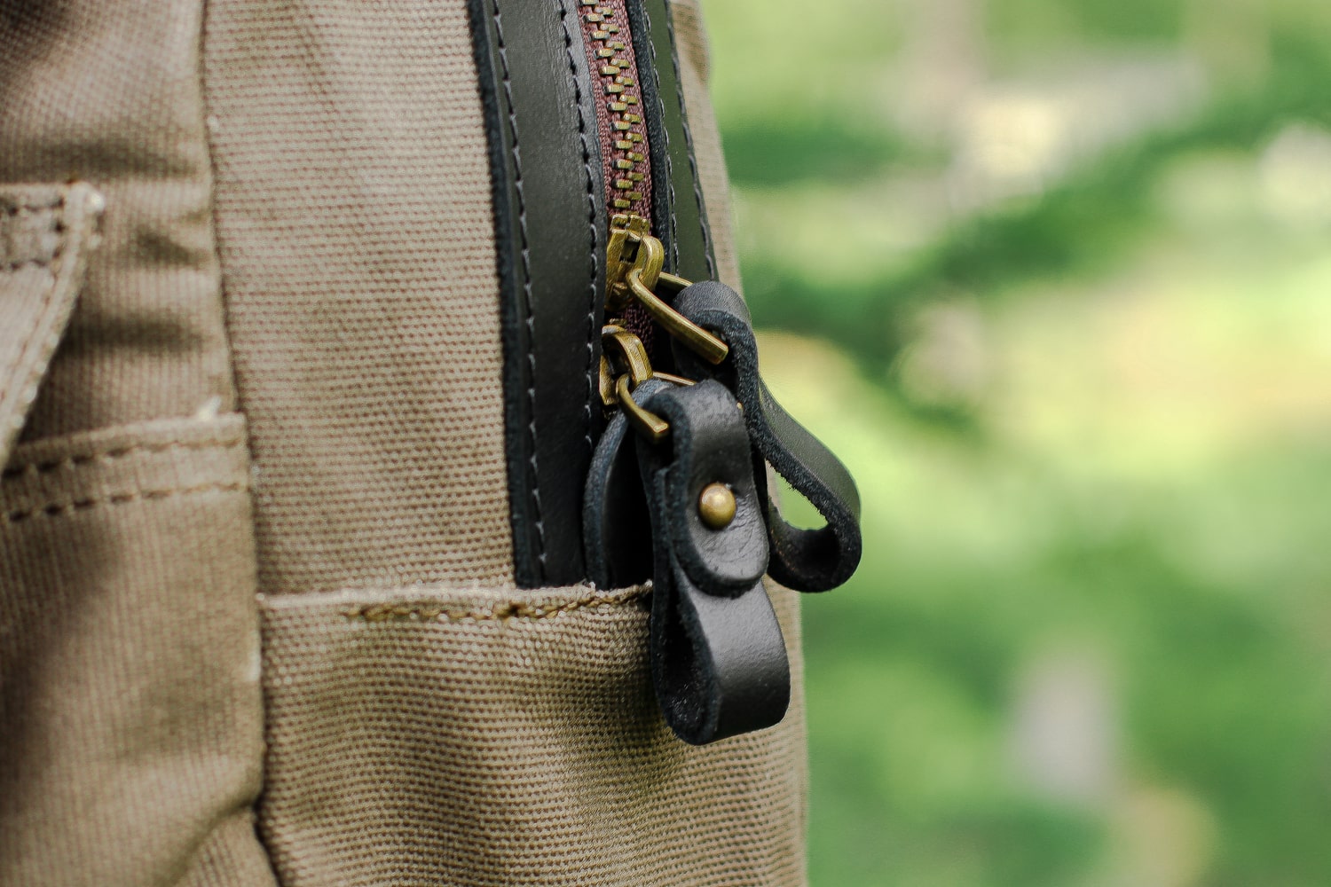 green waxed canvas rucksack