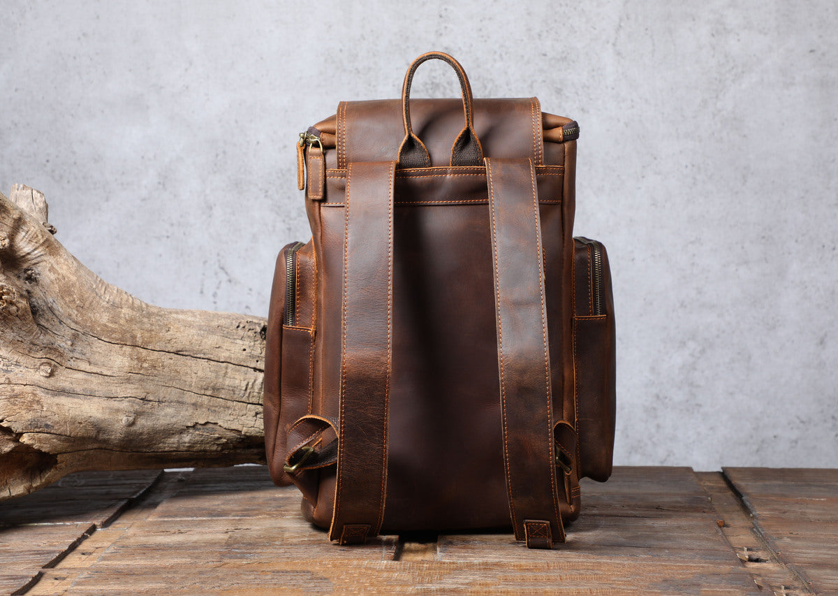 classic leather sleek carry-all backpack with laptop sleeve and gold-tone brass hardware