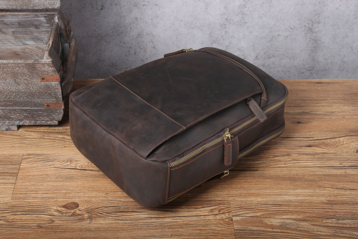 minimalist genuine leather backpack with laptop compartment