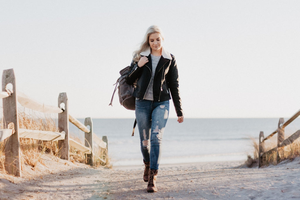 women wearing a vintage leather jacket