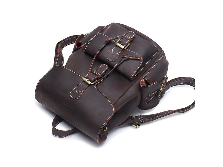 well made distressed leather ladies book-bag with smart side-pockets and anti-theft back pocket