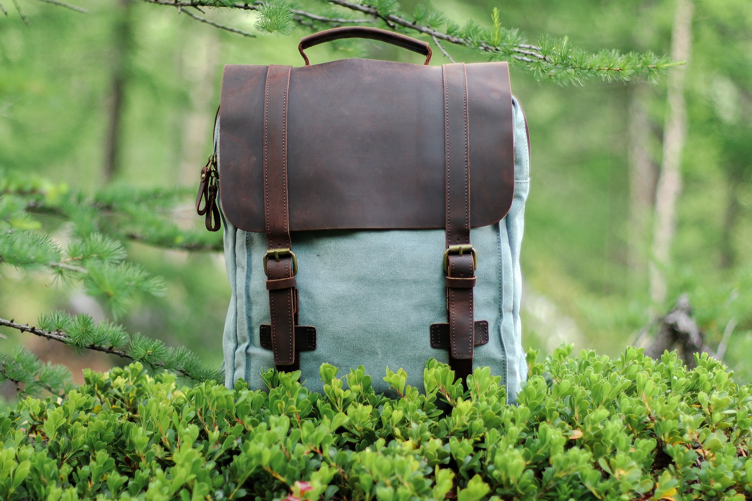 light blue vintage travel backpack canvas leather