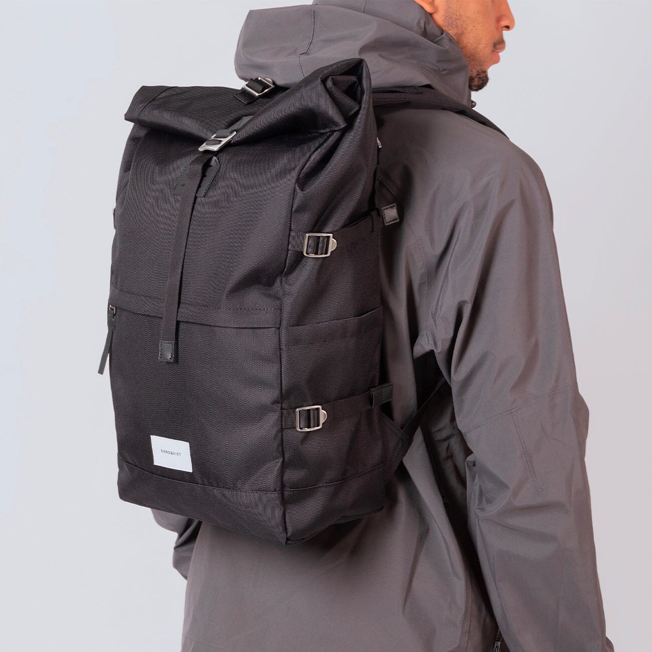 recycled urban backpack brent sandqvist black on man model