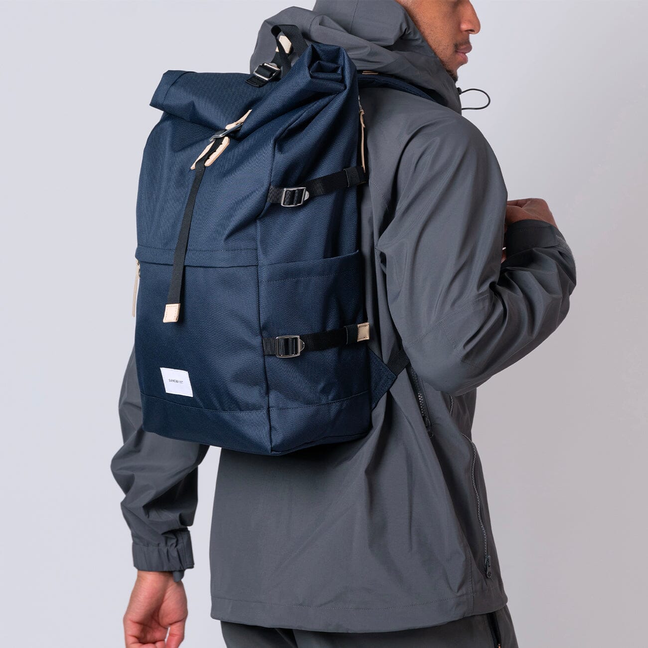 low carbon footprint recycled lightweight backpack backpack brent sandqvist navy color on man model