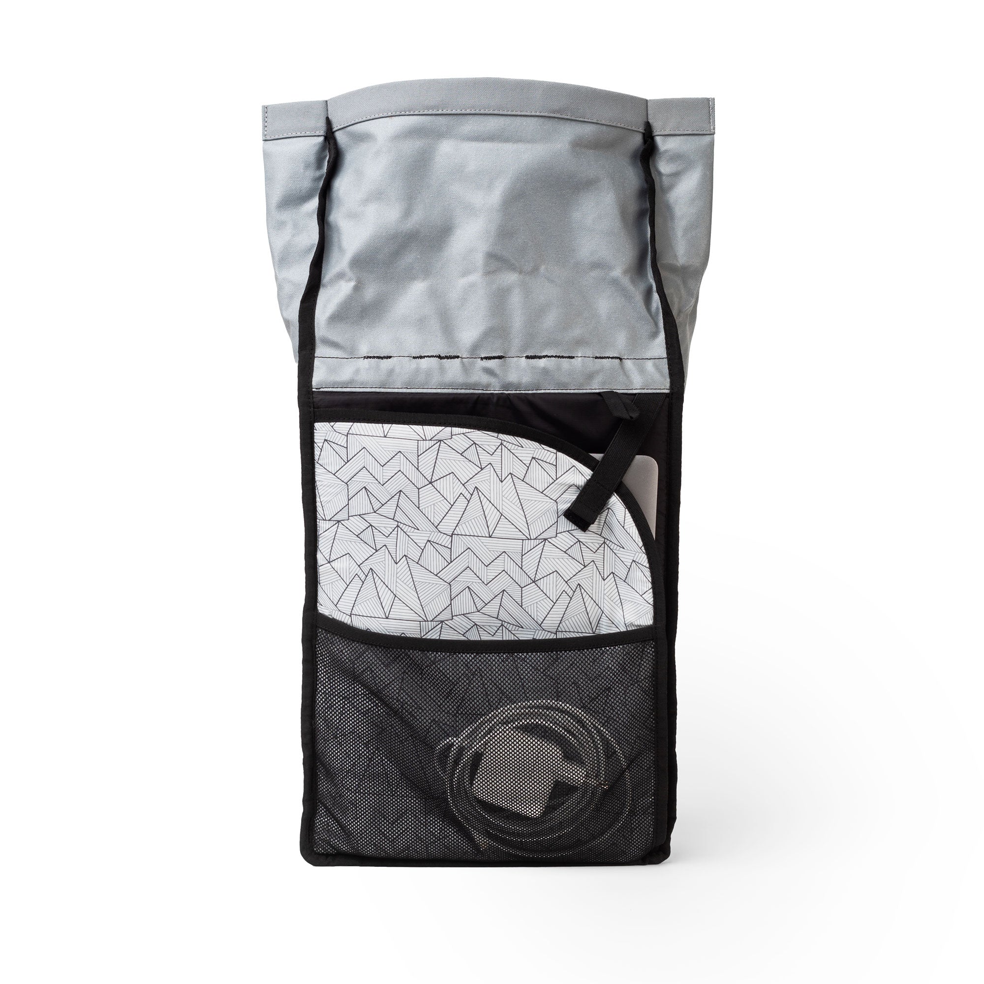 roomy compartment with mesh pocket and protected padded laptop sleeve of the eco friendly backpack from mero mero