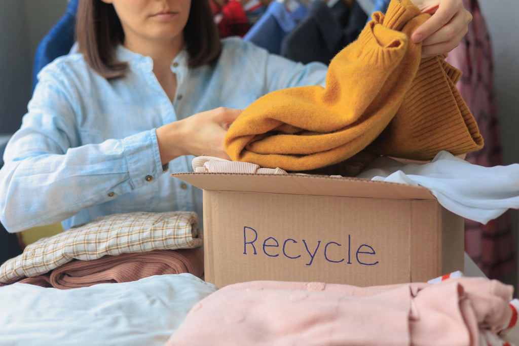 women selling second hand clothing