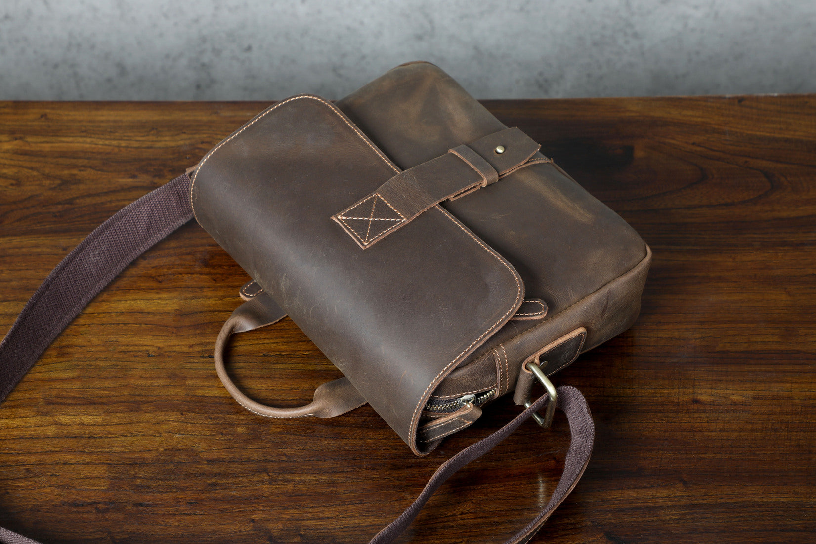 small brown leather messenger bag