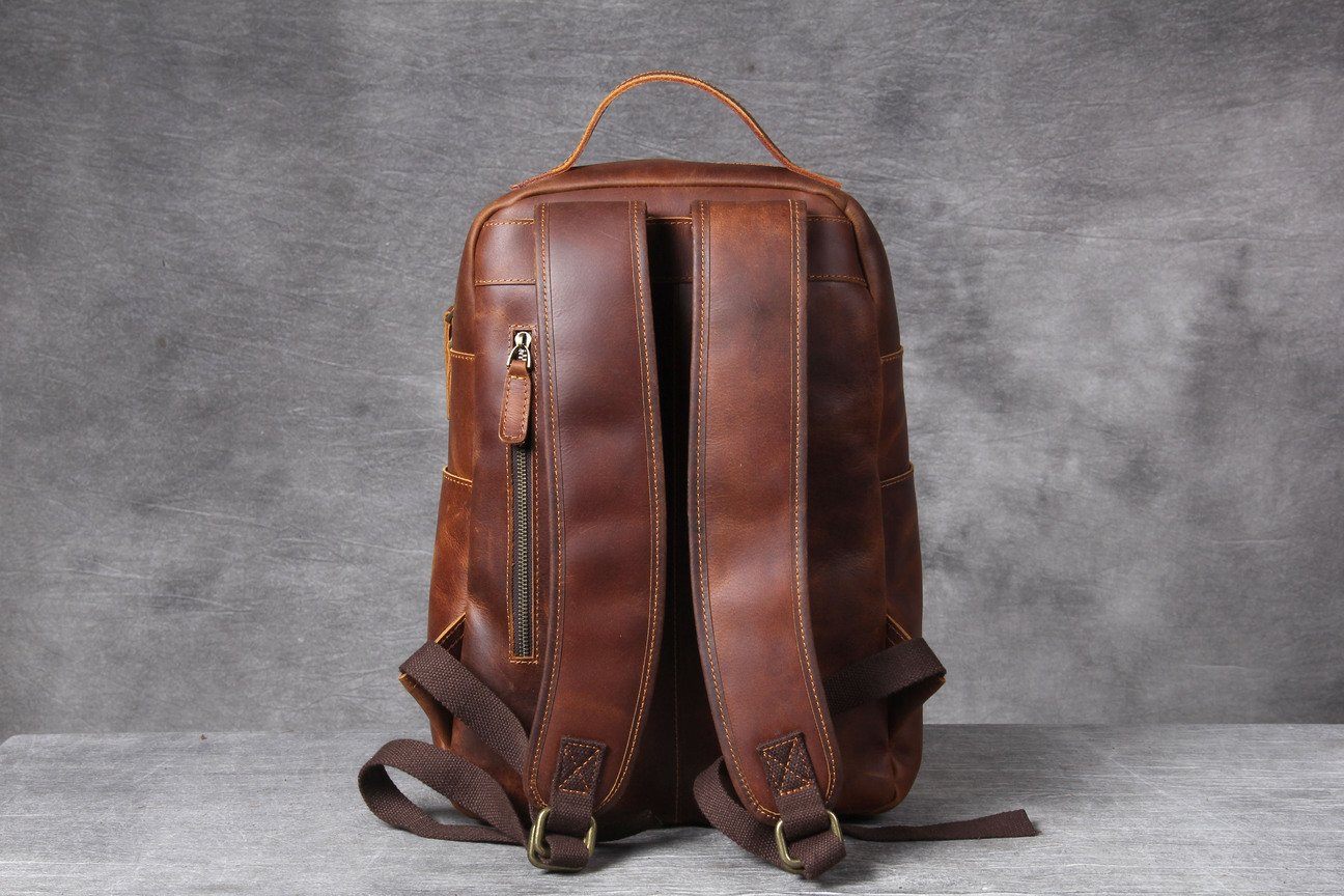 sleek small classic leather back pack