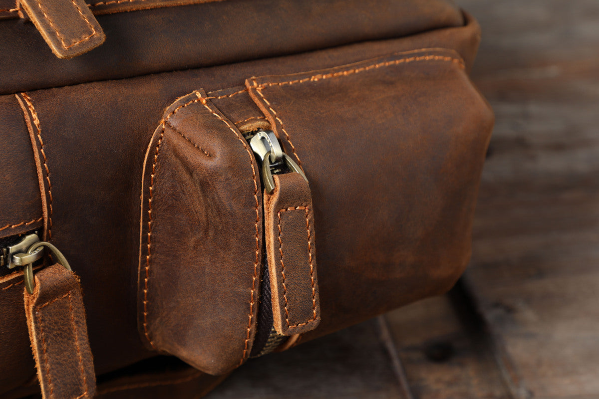 womens leather book-bag side pockets