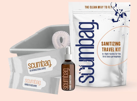 A photo of the SCUMBAG Sanitizing Travel Kit and what it includes: TSA approved 3oz. hand sanitizer Security Tray cover Antibacterial wipes Cleansing Towlette Each kit also includes an "air travel cheat sheet" that details how to best use your SCUMBAG and places to avoid when traveling.