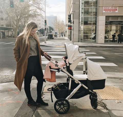 black and gold venicci pram