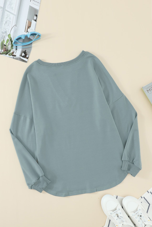 Bella Buttoned V-neck Relaxed top