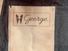 Load image into Gallery viewer, Denim Apron with 2 logo&#39;s and leather pocket (brown/black)