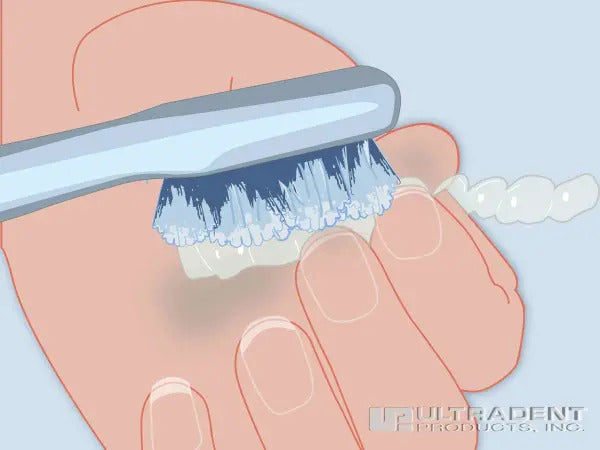 Clean tray (or your aligner tray) with a soft brush and cool tap water. Opalescence PF Step 4