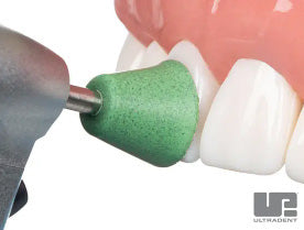 Use 7011 Jiffy Coarse Green Polishing cup to shape cusps, labial/buccal, and cervical areas.