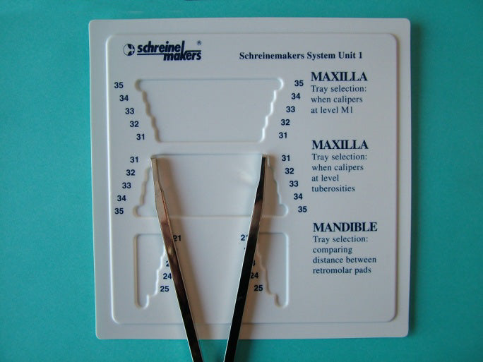 Placez le pied à coulisse sur le guide de mesure pour identifier facilement le plateau Border-Lock idéal pour ce patient.