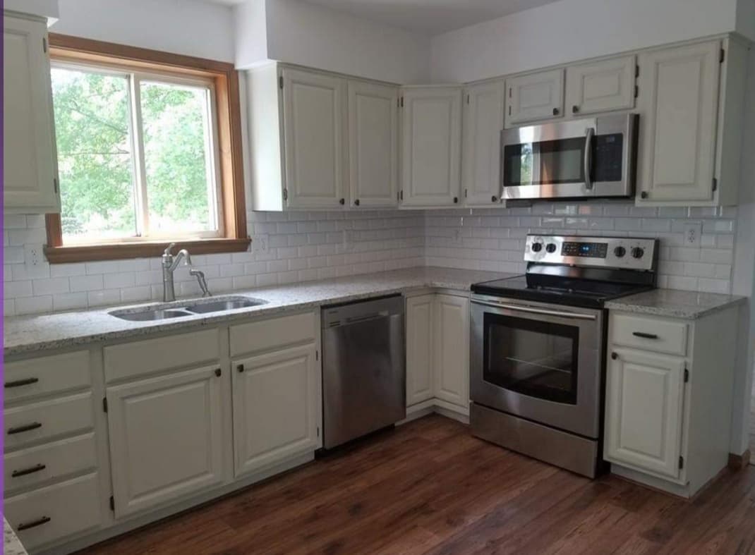 why most of our clients prefer refinishing their kitchen white wood coating refinished kitchen Grace on Broadway