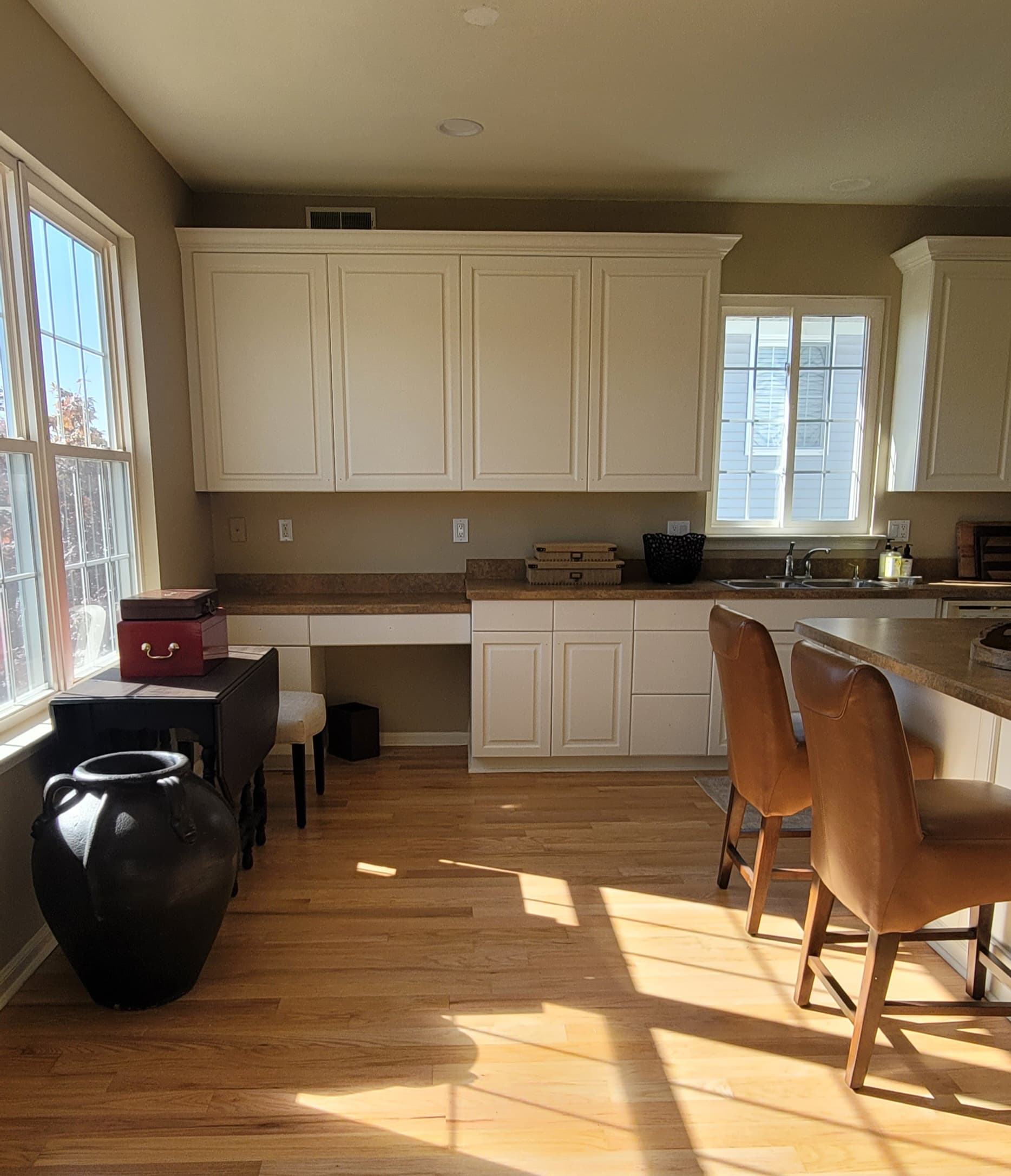 Elevate Your Kitchen with Timeless White Wood Coating by Grace on Broadway Refinishing