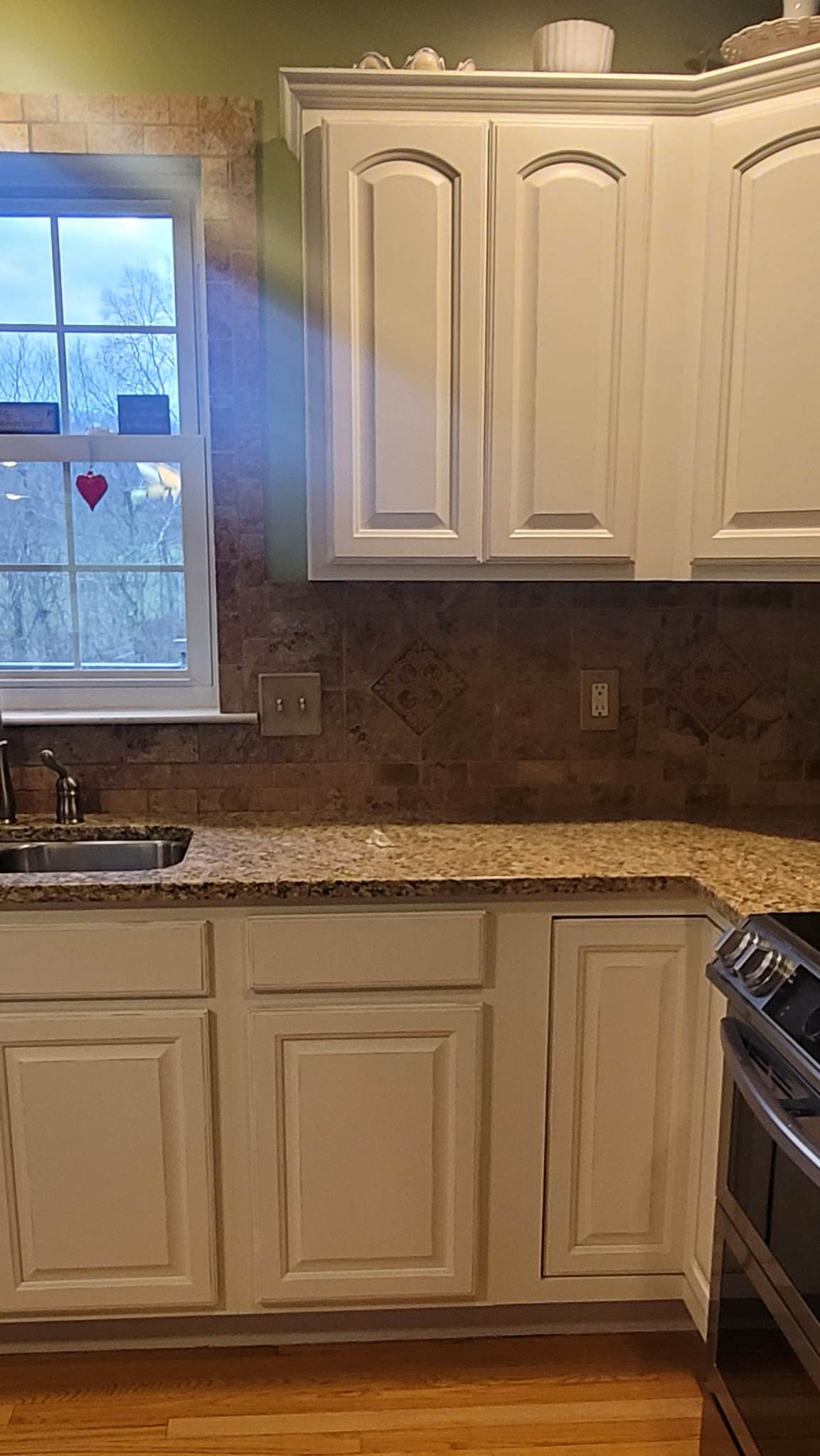 Grace on Broadway - Kitchen Refinishing in white wood coating