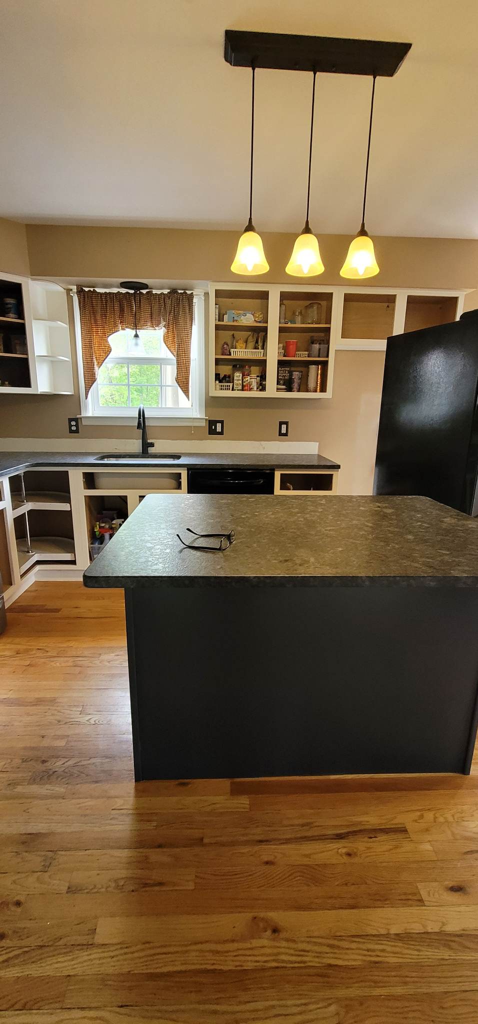 Elevating Your Home with Grace on Broadway Cabinet and Furniture Refinishing Featuring a Kitchen Refinished in White Wood Coating During Refinishing