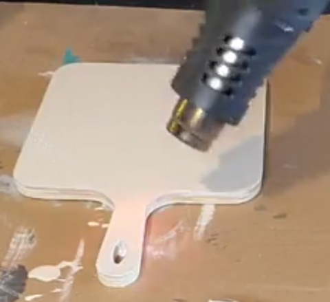 Heat gun on cutting board