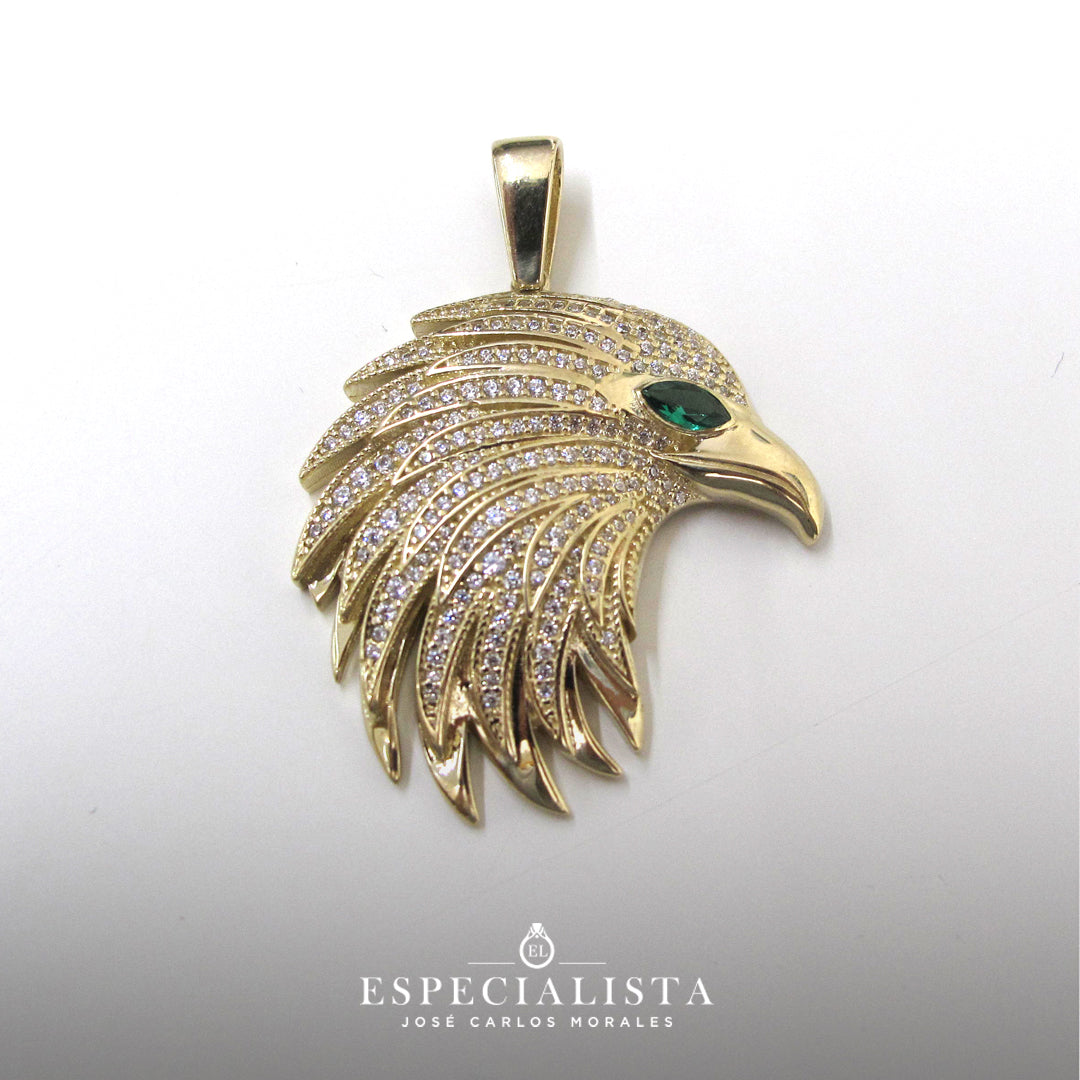 Dije en oro amarillo con figura de cabeza de águila. – Joyería El  Especialista