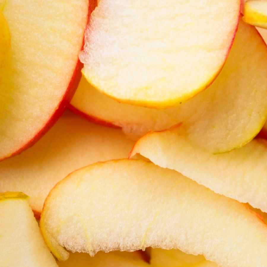 Fresh and delicious apple slices, one of the best summer dog-friendly treats available.