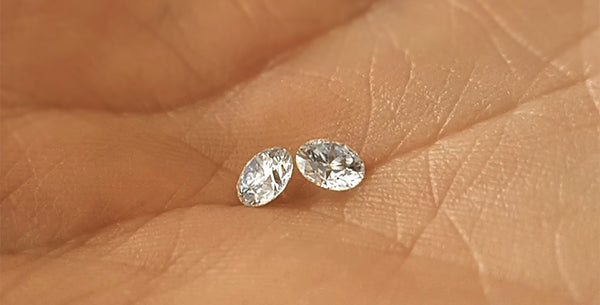 two small brilliant cut diamonds