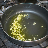 sautee garlic and olive oil for zoodles
