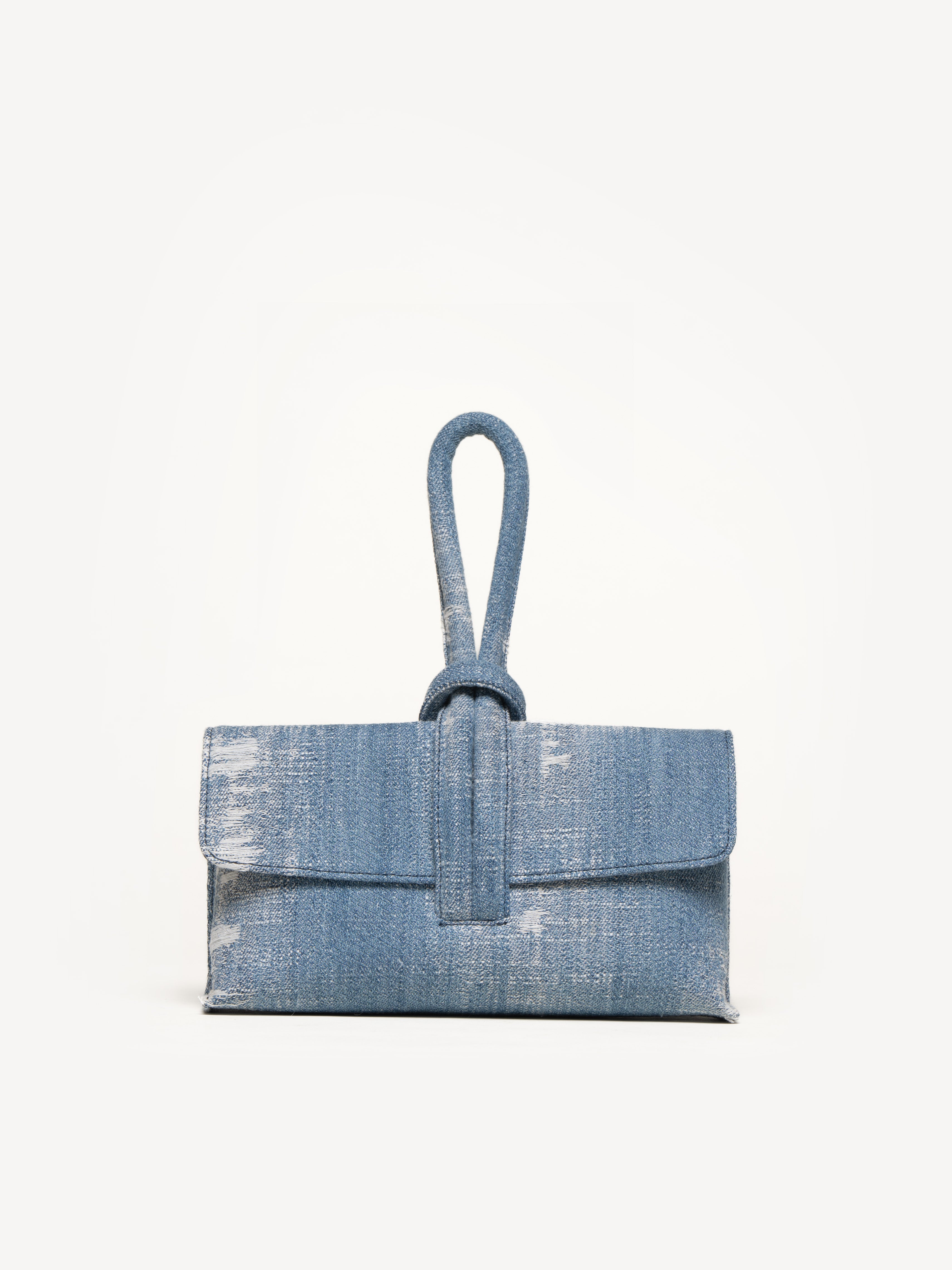 Shop M. Gemi The Francesca Convertible Crossbody In Distressed Denim