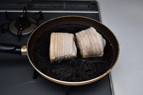 Boiled chashu in marinade to darken