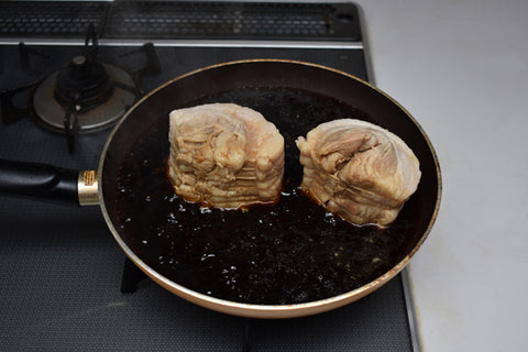 Chashu soaking in marinade