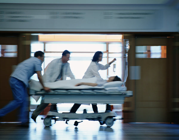 trauma center patient rushing through halls to surgery