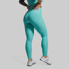 Teal peach skin faux fur lined leggings with a pink damask pattern. Made of  a 92% polyester and 8% Spandex blend. One size fits most., 731319