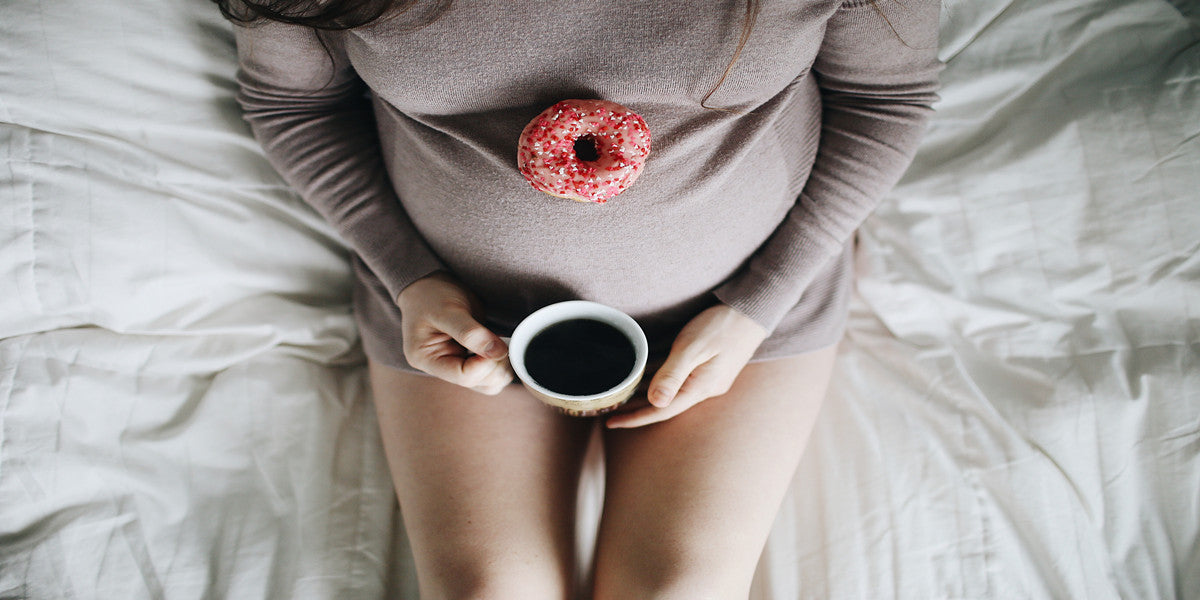 pregnant woman with coffee