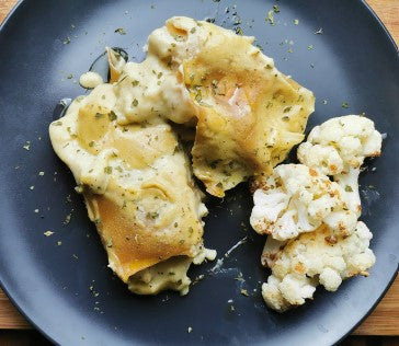 Cauliflower lasagana cannelloni on a plate, image by Sara Occhipinti