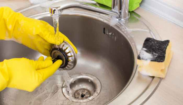 cleaning kitchen sink drain
