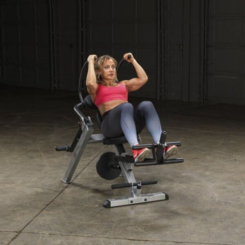 Body-Solid Semi-Recumbent Ab Bench fitness model exercising crunches