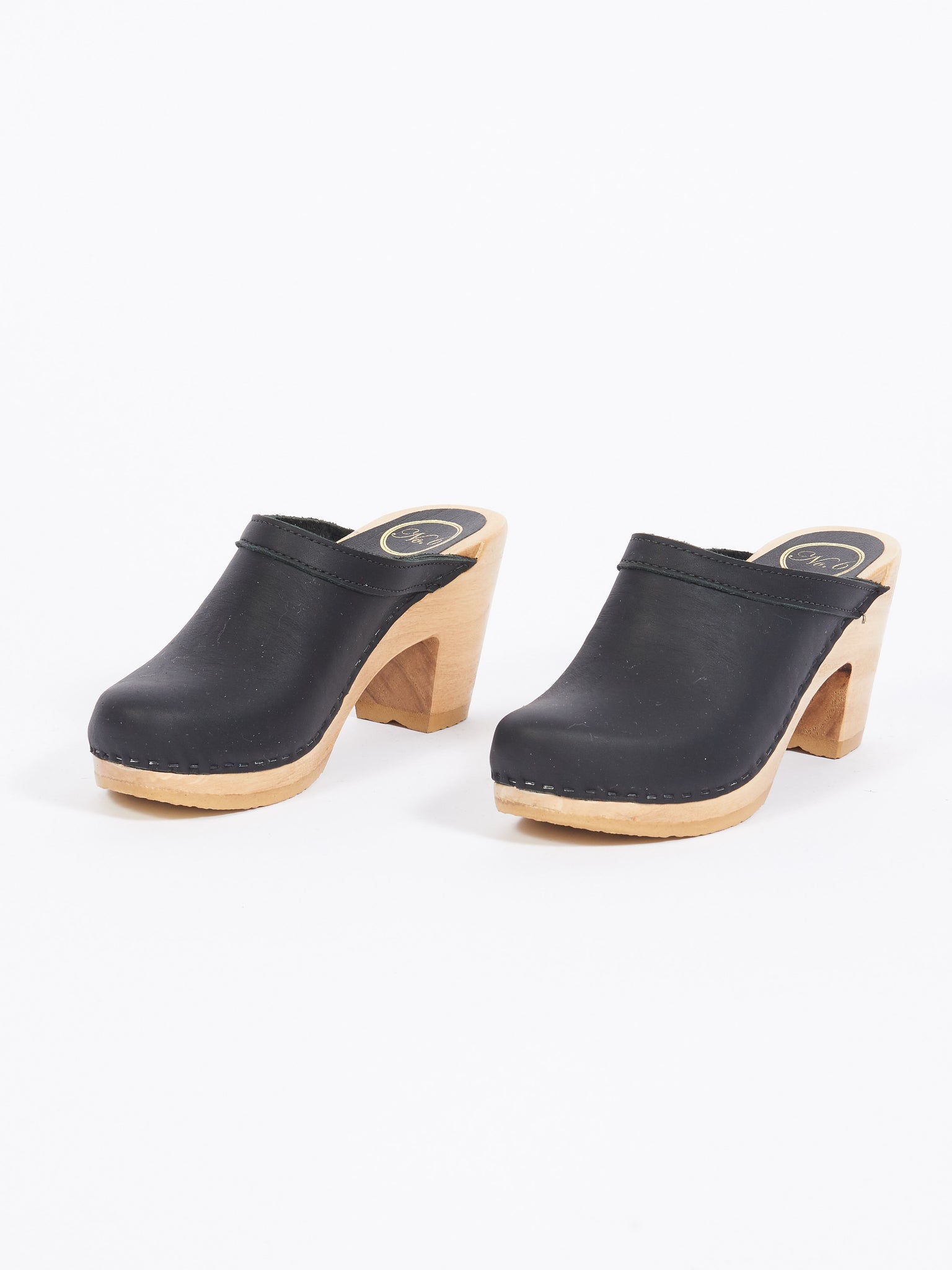 black heeled clogs
