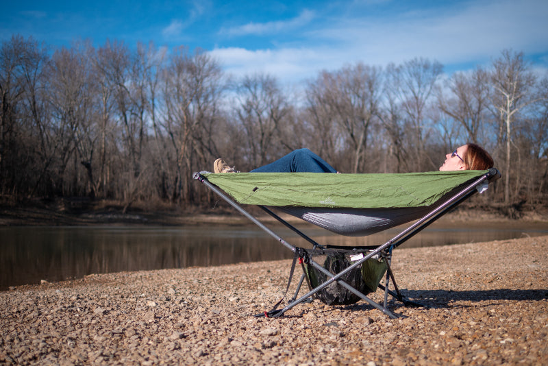 camping by the river with portale Mock One Hammock