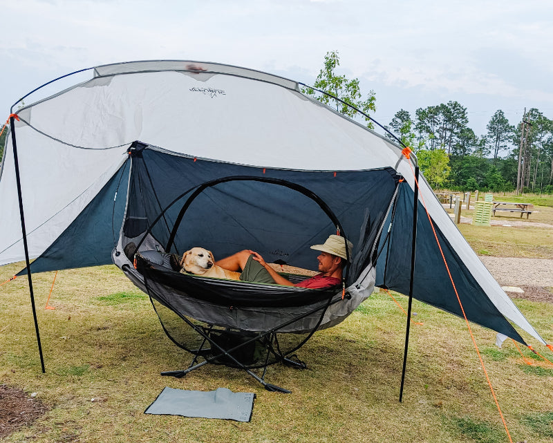 camping with dog tent and hammock