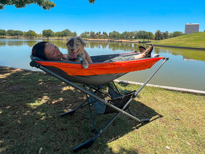 lake camping with dog and free standing hammock